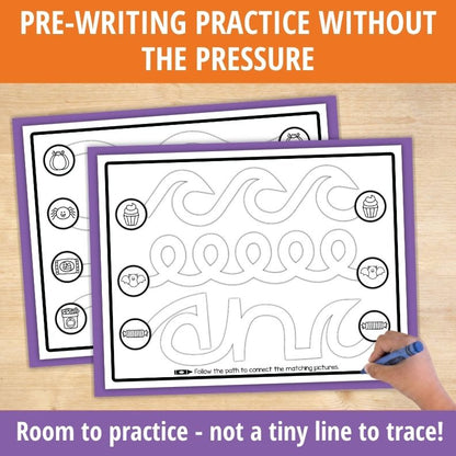 Child's hand tracing wavy pre-writing paths with Halloween pictures on purple-framed worksheet for line practice activity.