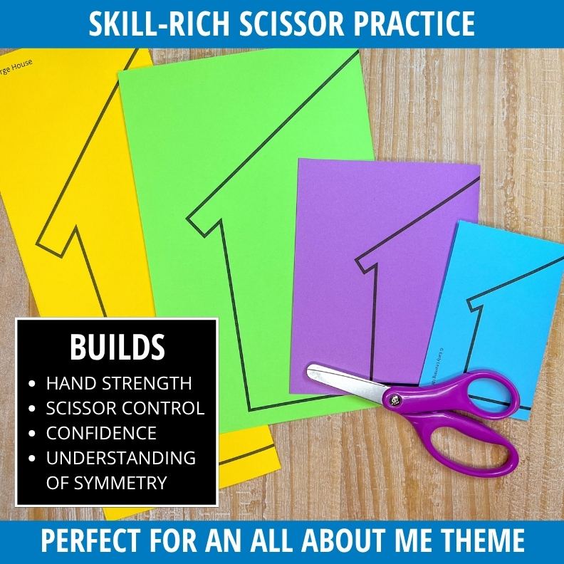 Colorful folded paper houses in yellow, green, purple, and blue with scissors cutting along outlined edges on wood surface.