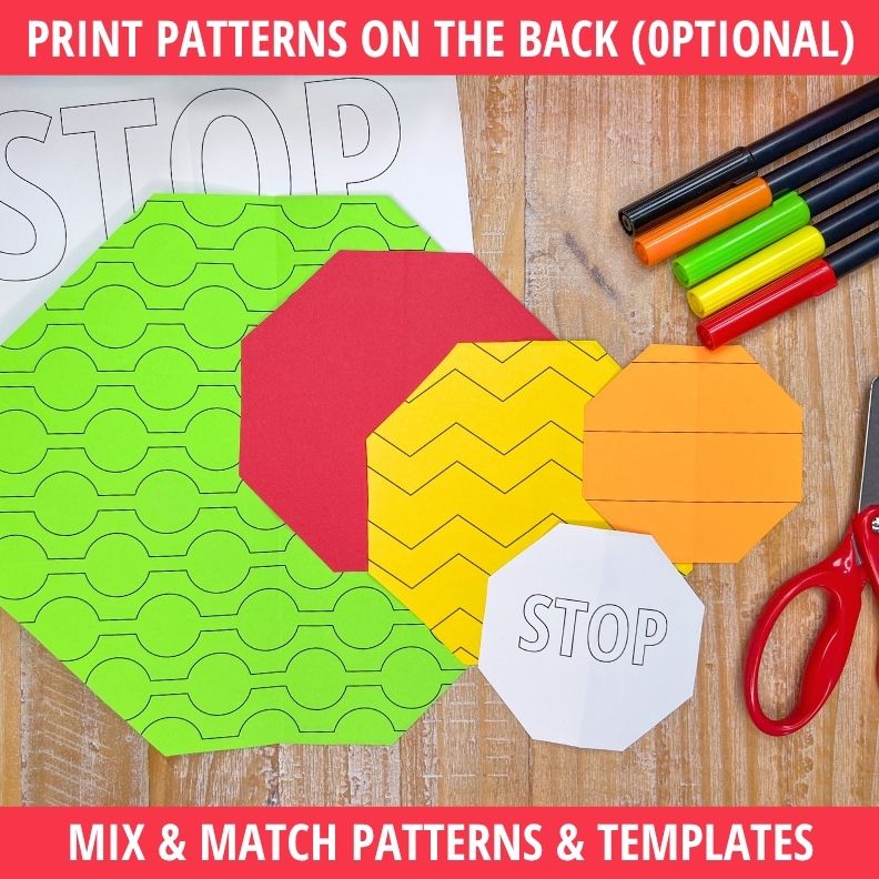 Colorful fold-and-cut stop sign templates in lime, red, yellow, and orange with geometric patterns, markers, and scissors on